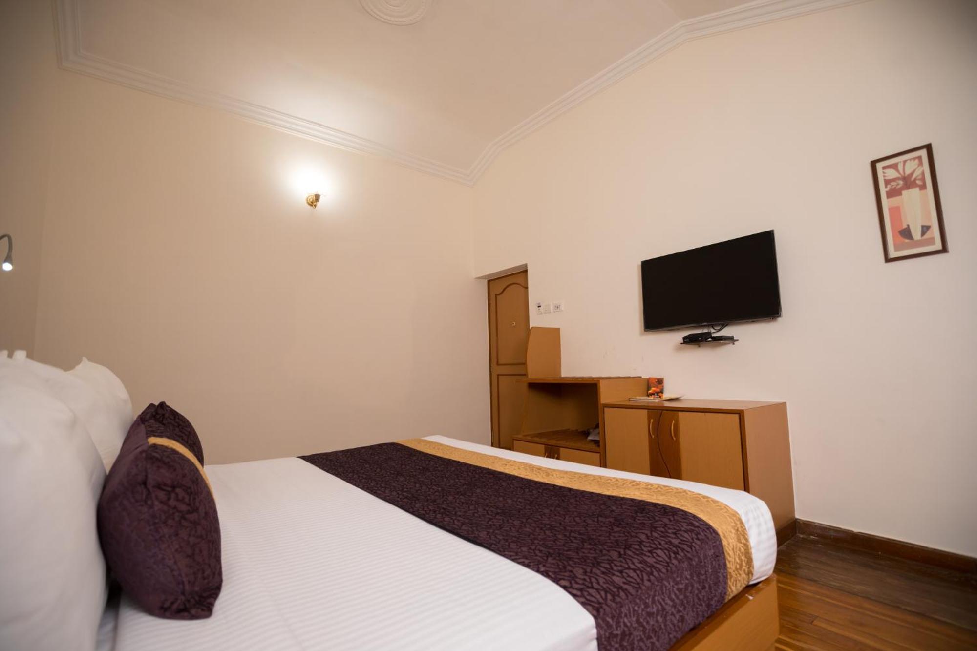 Hotel Kodai International Kodaikanal Quarto foto